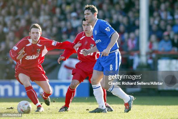 January 24: Scott Kerr of Scarborough and Frank Lampard of Chelsea challenge during the Fa Cup 4th Round match between Scarborough and Chelsea at...