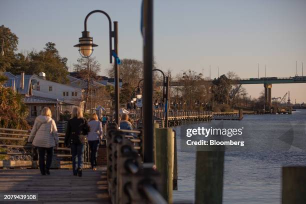 The historic downtown waterfront district runs along the Cape Fear River in Wilmington, North Carolina, US, on Wednesday, Feb. 21, 2024. Democrats...