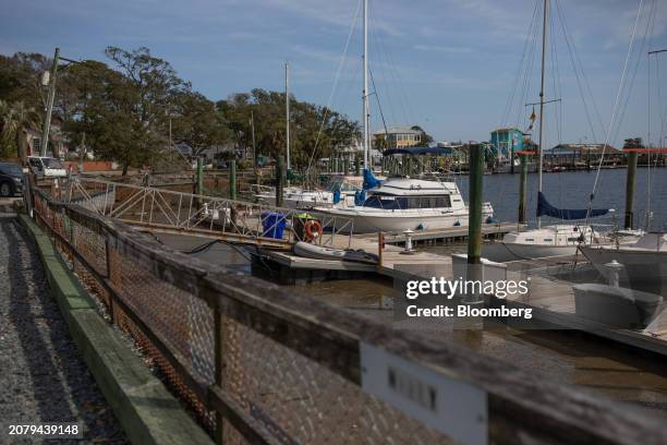 Boats dock at a harbor in Southport, North Carolina, US, on Thursday, Feb. 22, 2024. Democrats are targeting small towns in North Carolina, a swing...