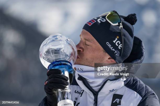 Tarjei Boe of Norway with the trophy for the sprint world cup score after the Men 10 km Sprint at the BMW IBU World Cup Biathlon on March 15, 2024 in...