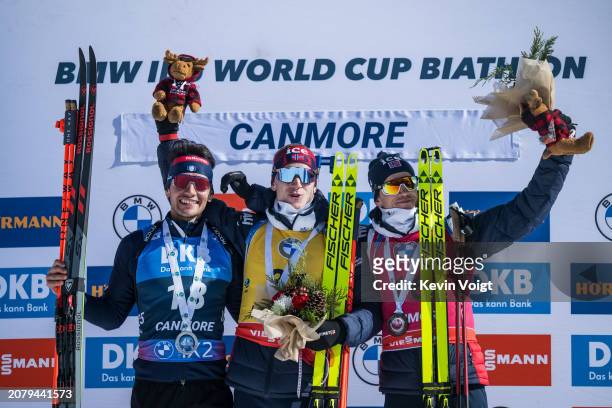 Second placed Tommaso Giacomel of Italy, first placed Johannes Thingnes Boe of Norway and third placed Tarjei Boe of Norway celebrates during the...