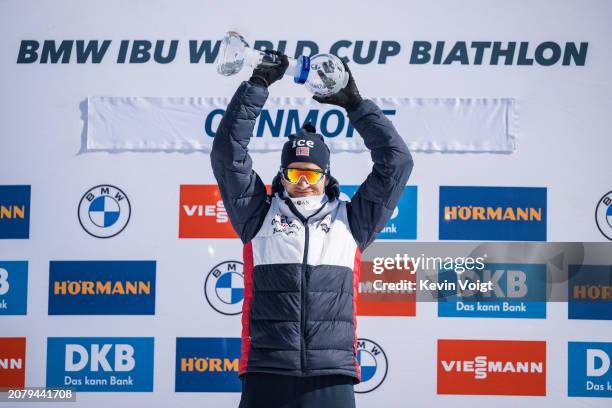 Tarjei Boe of Norway with the trophy during the award ceremony for the sprint world cup score after the Men 10 km Sprint at the BMW IBU World Cup...