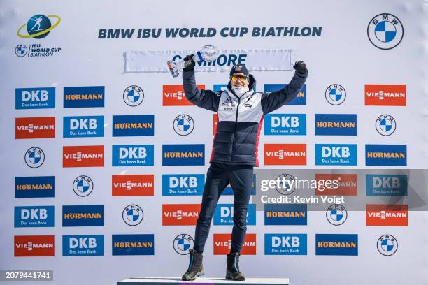 Tarjei Boe of Norway with the trophy during the award ceremony for the sprint world cup score after the Men 10 km Sprint at the BMW IBU World Cup...