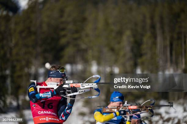 Tarjei Boe of Norway at the shooting range during the Men 10 km Sprint at the BMW IBU World Cup Biathlon on March 15, 2024 in Canmore, Canada.