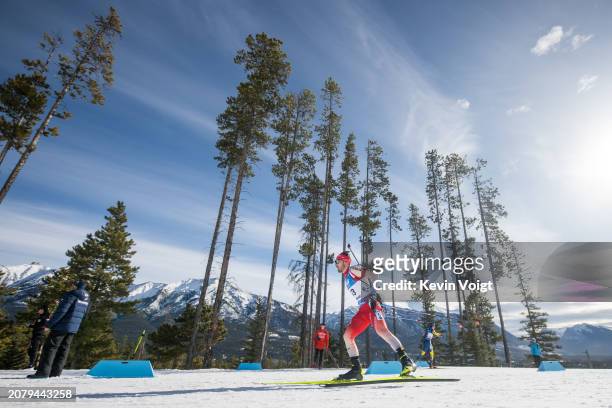 Joscha Burkhalter of Switzerland in action during the Men 10 km Sprint at the BMW IBU World Cup Biathlon on March 15, 2024 in Canmore, Canada.