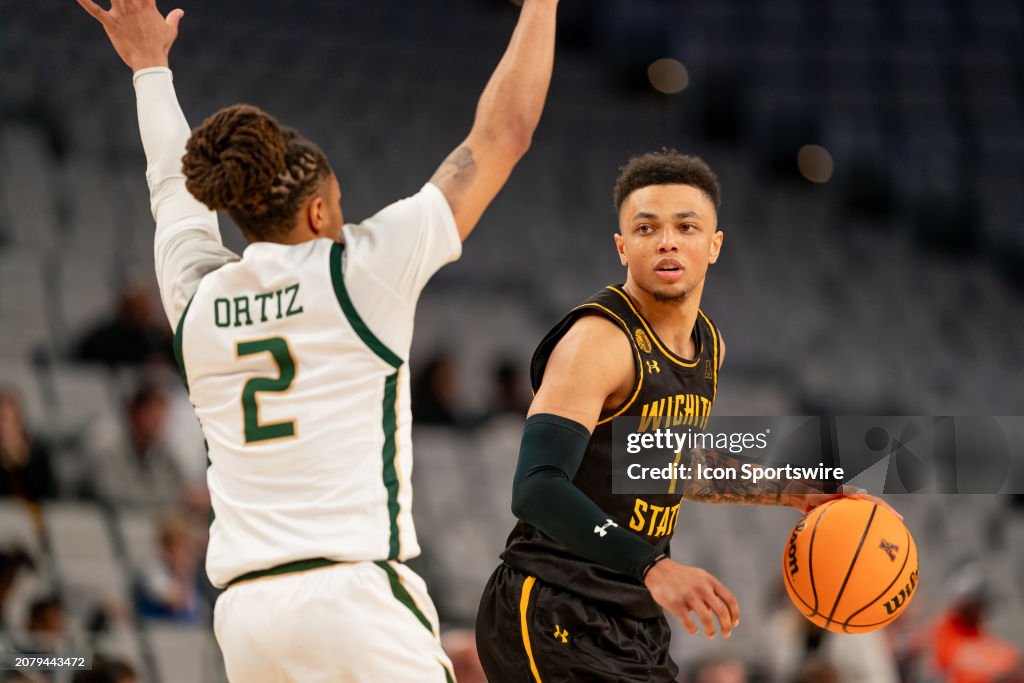 Xavier Bell Wichita State Shockers guard Xavier Bell is guarded by UAB Blazers ...
