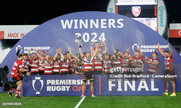 Gloucester players lift the Premiership Cup during the Premiership Rugby Cup Final match between Gloucester Rugby and Leicester Tigers at Kingsholm...