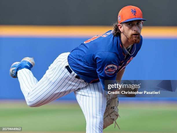 Nolan McLean of the New York Mets throws a warm-up pitch prior to the top of the fifth inning of a spring training game against the Washington...