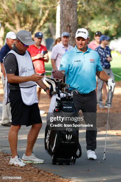 Golfer Ryan Fox waits to play a shot from the pine straw on the 11th hole during The Players Championship on March 15 at TPC Sawgrass in Ponte Vedra...