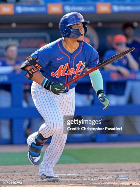 Vincent Perozo of the New York Mets watches his RBI single during the bottom of the fifth inning of a spring training game against the Washington...