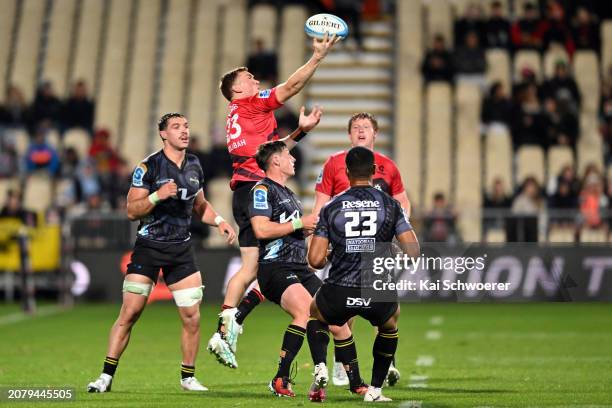 Dallas McLeod of the Crusaders grabs the ball during the round four Super Rugby Pacific match between the Crusaders and Hurricanes at Apollo Projects...