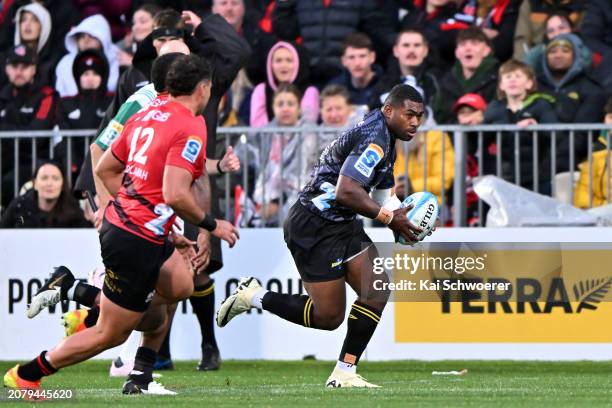 Kini Naholo of the Hurricanes charges forward during the round four Super Rugby Pacific match between the Crusaders and Hurricanes at Apollo Projects...