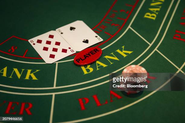 Cards and chips on a Baccarat Super 6 table inside Philippine Amusement and Gaming Corp.'s Casino Filipino Citystate, in Manila, the Philippines, on...