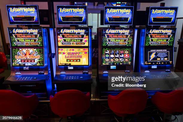 Slot machines inside Philippine Amusement and Gaming Corp.'s Casino Filipino Citystate, in Manila, the Philippines, on Thursday, March 14, 2024....