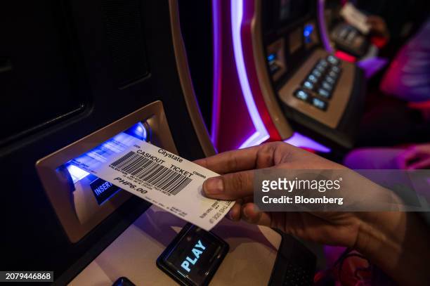 Slot machines inside Philippine Amusement and Gaming Corp.'s Casino Filipino Citystate, in Manila, the Philippines, on Thursday, March 14, 2024....