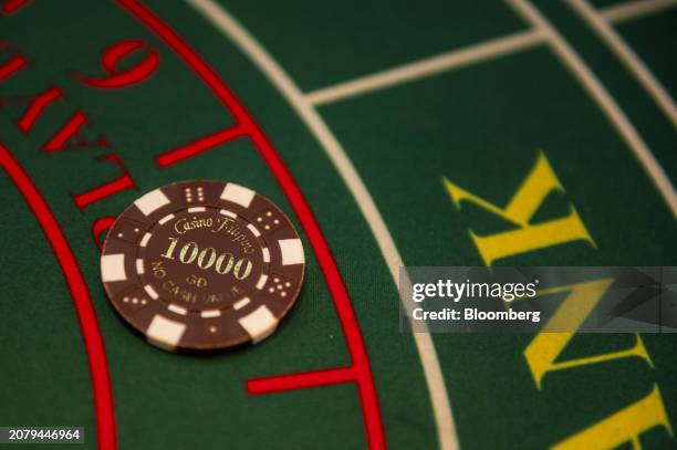 Baccarat Super 6 table inside Philippine Amusement and Gaming Corp.'s Casino Filipino Citystate, in Manila, the Philippines, on Thursday, March 14,...