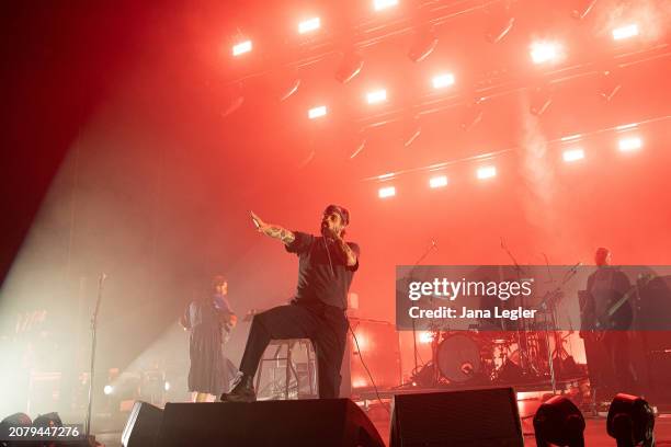 Mark Bowen, Joe Talbot, Jon Beavis and Adam Devonshire and Lee Kiernan of British band Idles perform live on stage during a concert at...
