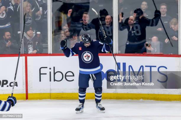 Kyle Connor of the Winnipeg Jets celebrates after scoring a first period goal against the Anaheim Ducks at the Canada Life Centre on March 15, 2024...