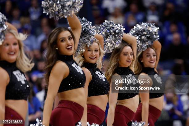 The Texas A&M Aggies dance team performs during a quarterfinal round game of the men's Southeastern Conference Tournament between the Kentucky...