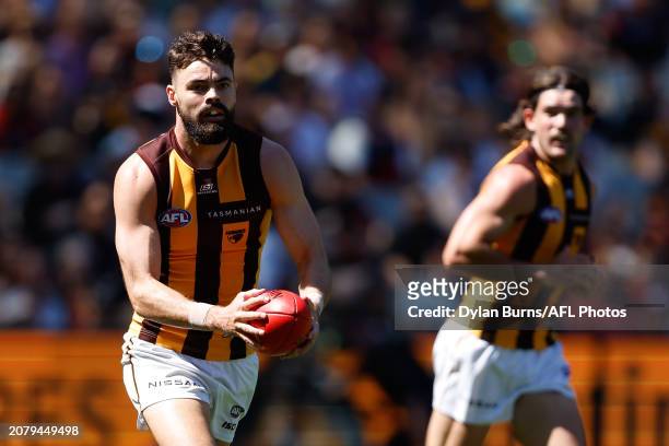 Conor Nash of the Hawks in action during the 2024 AFL Round 01 match between the Essendon Bombers and the Hawthorn Hawks at the Melbourne Cricket...