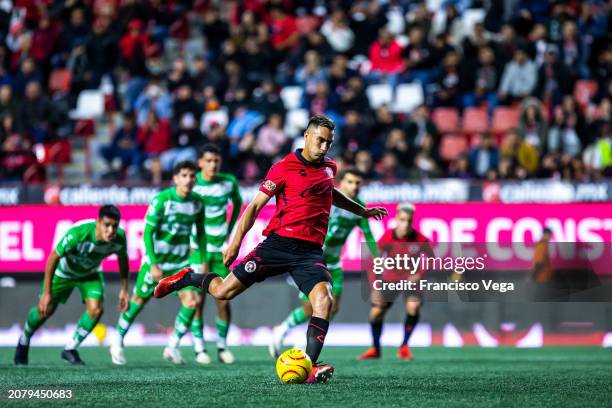 Christian Rivera of Tijuana shots a penalty to score the second goal of Tijuana during the 12th round match between Tijuana and Santos Laguna as part...