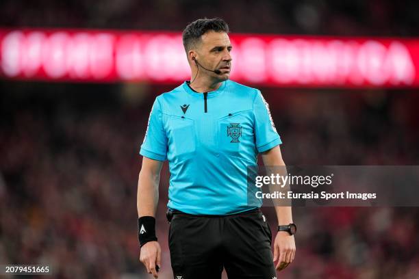 Referee Manuel Oliveira walks in the field during the Liga Portugal Betclic match between SL Benfica and GD Estoril at Estadio do Sport Lisboa e...