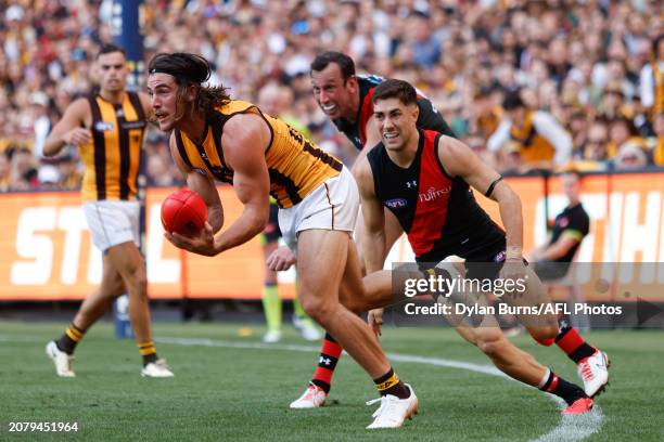 Jai Newcombe of the Hawks in action during the 2024 AFL Round 01 match between the Essendon Bombers and the Hawthorn Hawks at the Melbourne Cricket...