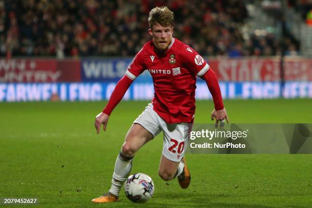 Andy Cannon of Wrexham is playing in the Sky Bet League 2 match between Wrexham and Harrogate Town at the Glyndwr University Racecourse Stadium in...