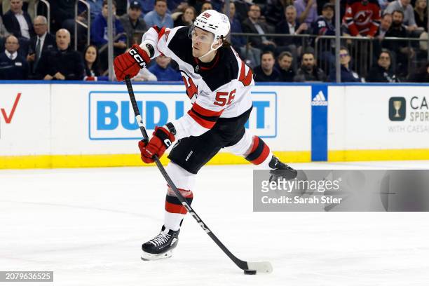 Erik Haula of the New Jersey Devils controls the puck during the first period against the New York Rangers at Madison Square Garden on March 11, 2024...