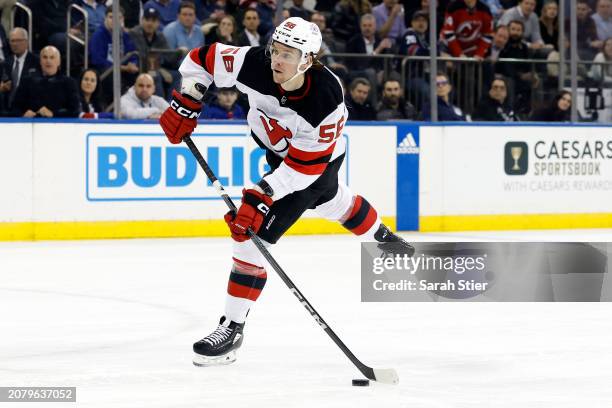 Erik Haula of the New Jersey Devils controls the puck during the first period against the New York Rangers at Madison Square Garden on March 11, 2024...