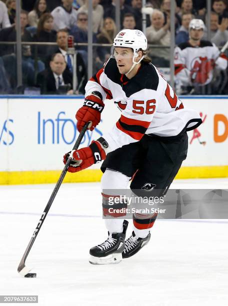 Erik Haula of the New Jersey Devils controls the puck during the first period against the New York Rangers at Madison Square Garden on March 11, 2024...