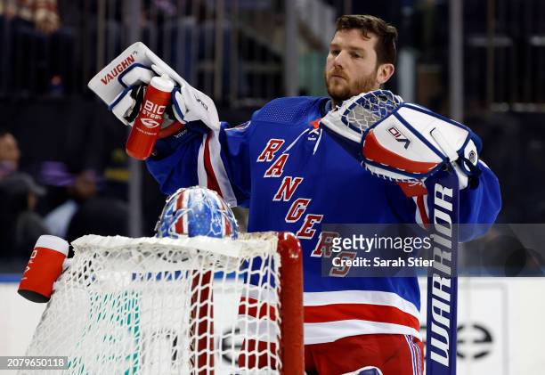 Jonathan Quick of the New York Rangers looks on during the first period against the New Jersey Devils at Madison Square Garden on March 11, 2024 in...