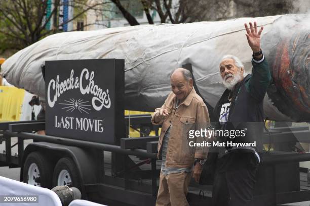 Cheech Marin and Tommy Chong attend the Premiere of "Cheech and Chong's Last Movie" with a large marijuana joint at The Paramount Theatre during the...