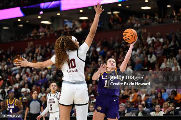 Kamilla Cardoso of the South Carolina Gamecocks blocks a layup attempt by Hailey Van Lith of the LSU Lady Tigers in the second quarter during the...