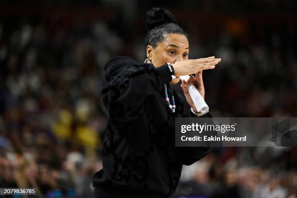 Head coach Dawn Staley of the South Carolina Gamecocks calls a time out against the LSU Lady Tigers in the fourth quarter during the championship...