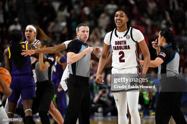 Ashlyn Watkins of the South Carolina Gamecocks celebrate a call as an altercation breaks out behind her against the LSU Lady Tigers in the fourth...