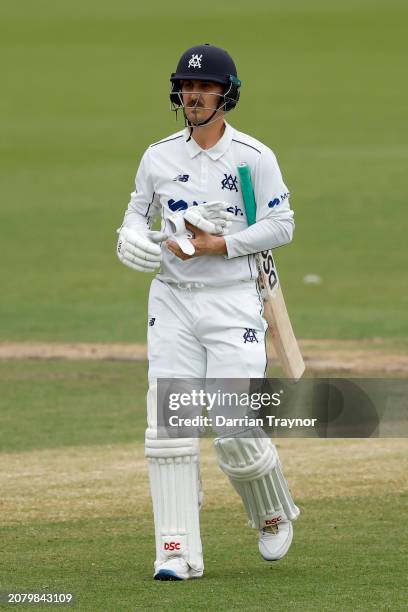 Dejected Nic Maddinson of Victoria walks from the ground after being dismissed during the Sheffield Shield match between Victoria and Western...