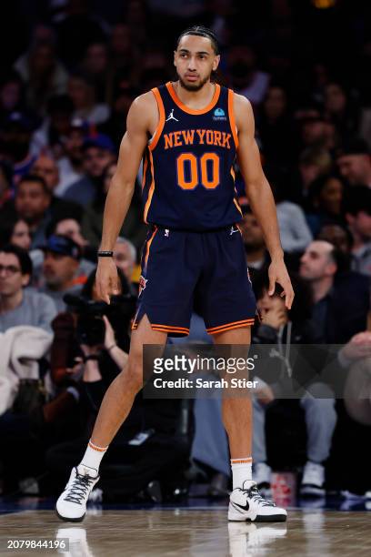 Jacob Toppin of the New York Knicks looks on during the second half against the Orlando Magic at Madison Square Garden on March 08, 2024 in New York...