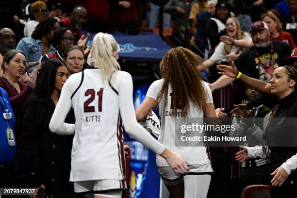 Chloe Kitts and and Kamilla Cardoso of the South Carolina Gamecocks are ejected from the game following an altercation against the LSU Lady Tigers in...