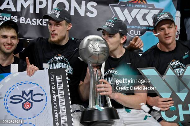 The Saint Mary's Gaels celebrate with the championship trophy after the team defeated the Gonzaga Bulldogs in the championship game of the West Coast...