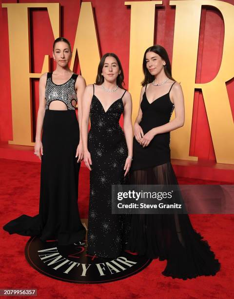 Este Haim, Alana Haim, and Danielle Haim arrives at the 2024 Vanity Fair Oscar Party Hosted By Radhika Jones at Wallis Annenberg Center for the...