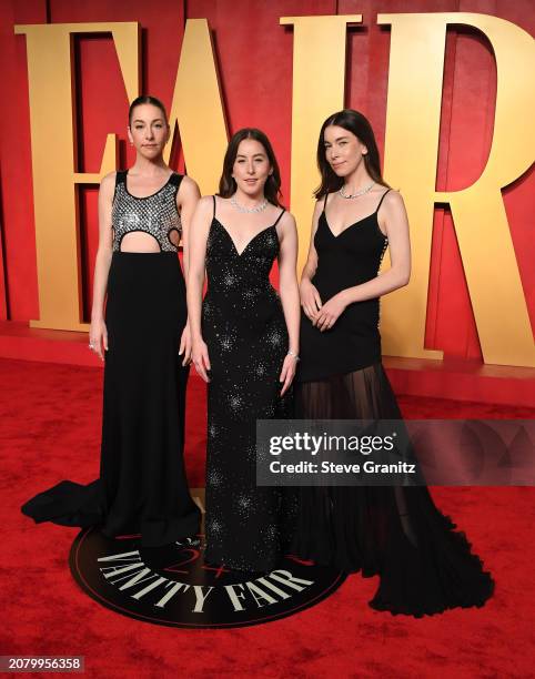 Este Haim, Alana Haim, and Danielle Haim arrives at the 2024 Vanity Fair Oscar Party Hosted By Radhika Jones at Wallis Annenberg Center for the...