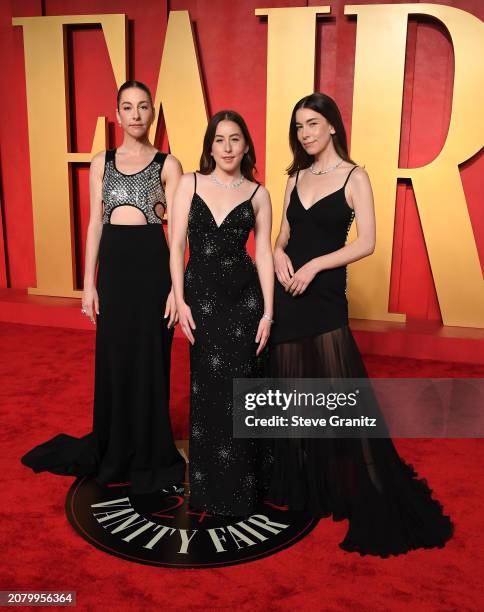 Este Haim, Alana Haim, and Danielle Haim arrives at the 2024 Vanity Fair Oscar Party Hosted By Radhika Jones at Wallis Annenberg Center for the...