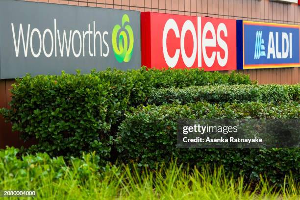 Woolworths, Coles and Aldi signage supermarket signage on March 13, 2024 in Melbourne, Australia. Australia's two major supermarket chains, Coles and...