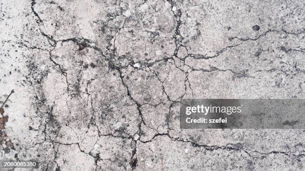 crack in cement concrete surface - old ruin stock pictures, royalty-free photos & images