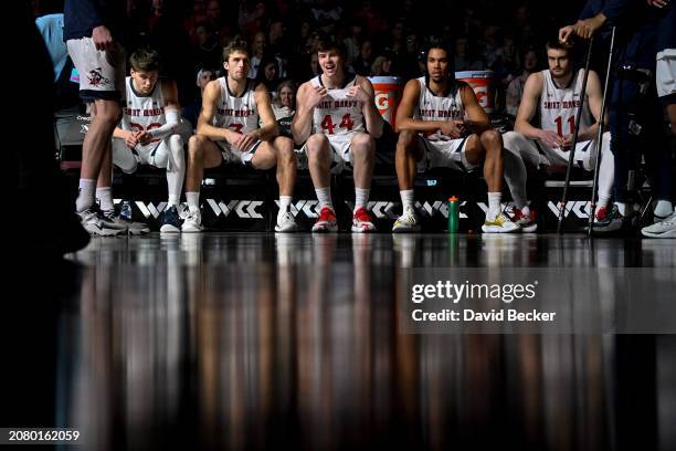 Aidan Mahaney, Augustas Marciulionis, Alex Ducas, Mason Forbes and Mitchell Saxen of the Saint Mary's Gaels wait for their introductions before a...