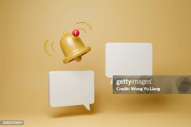 speech bubble with bell notification and yellow background - campana foto e immagini stock