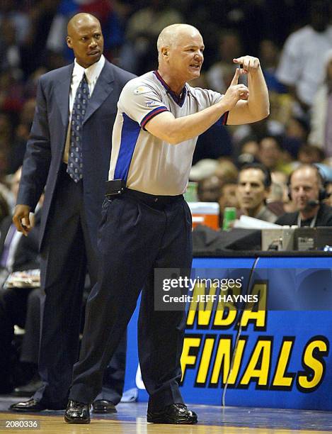 Referee Joey Crawford calls a technical against the New Jersey Nets as head coach Byron Scott reacts during the first half of game five of the NBA...