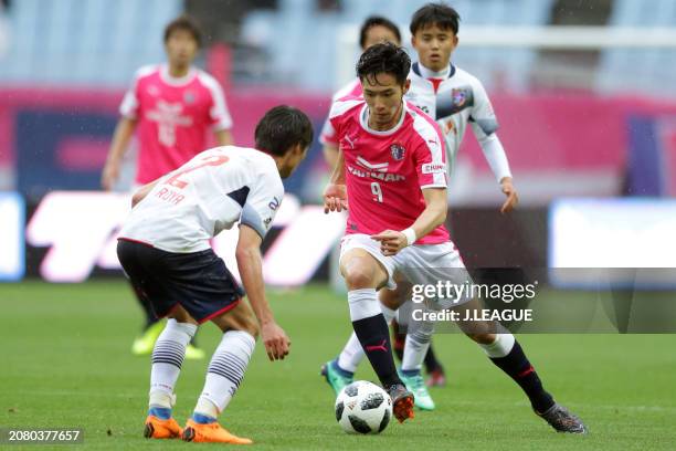 Kenyu Sugimoto of Cerezo Osaka takes on Sei Muroya of FC Tokyo during the J.League J1 match between Cerezo Osaka and FC Tokyo at Yanmar Stadium Nagai...