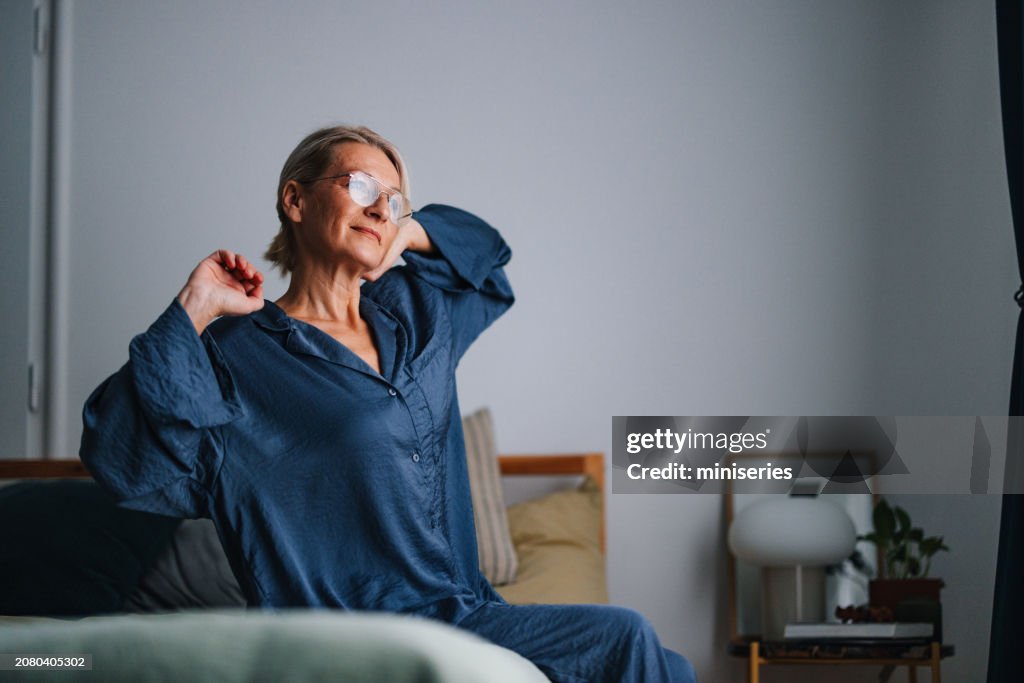 Portrait of an Older Woman Waking Getting up in the Morning